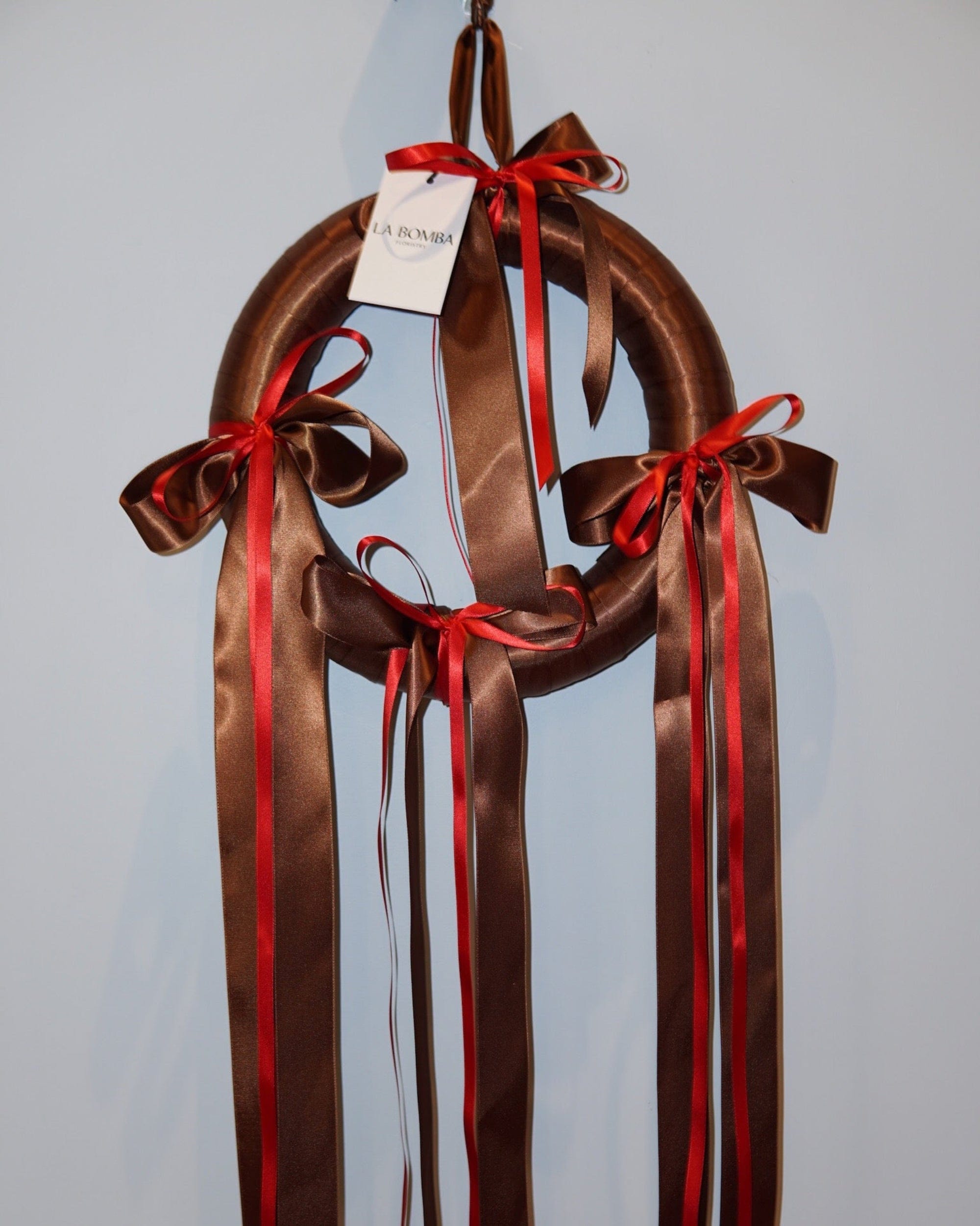 La Bomba Floristry Flowers Holiday Ribbon Wreath - Chocolate/ Red 12.5" La Bomba Floristry Vancouver Canada Holiday Ribbon Wreath - Chocolate/ Red 12.5"
